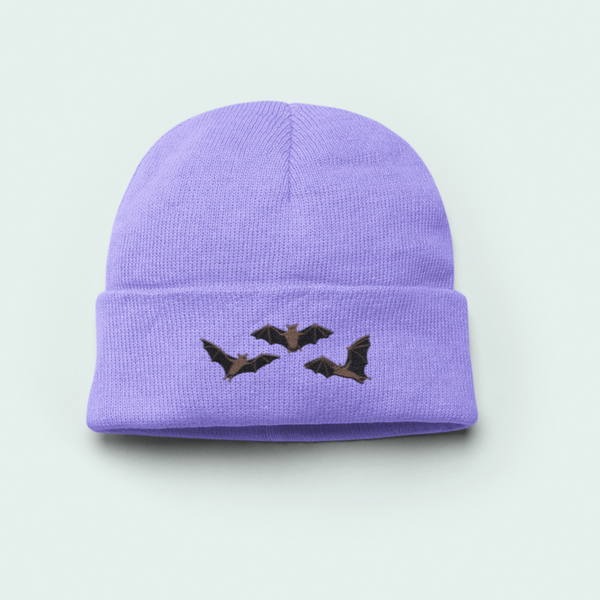 Purple beanie with bats embroidered on the beanie hat.