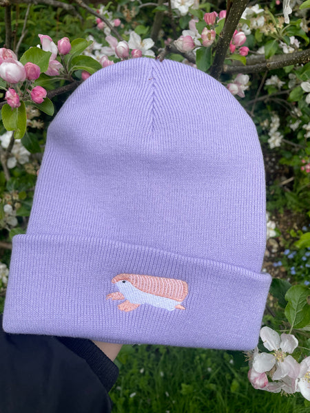 Pink Fairy Armadillo Embroidered Beanie Hat by Wonderful World. Embroidered Pink Fairy Armadillo.