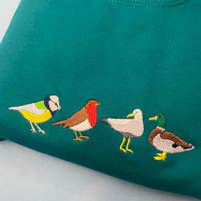 Embroidered bird sweatshirt sale