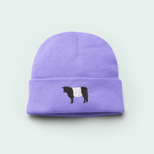 Purple Galloway Cow beanie with a black and white cow design.