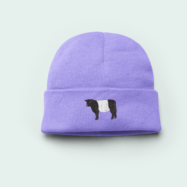 Purple Galloway Cow beanie with a black and white cow design.